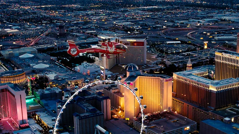 The Las Vegas casinos lit up beneath a helicopter