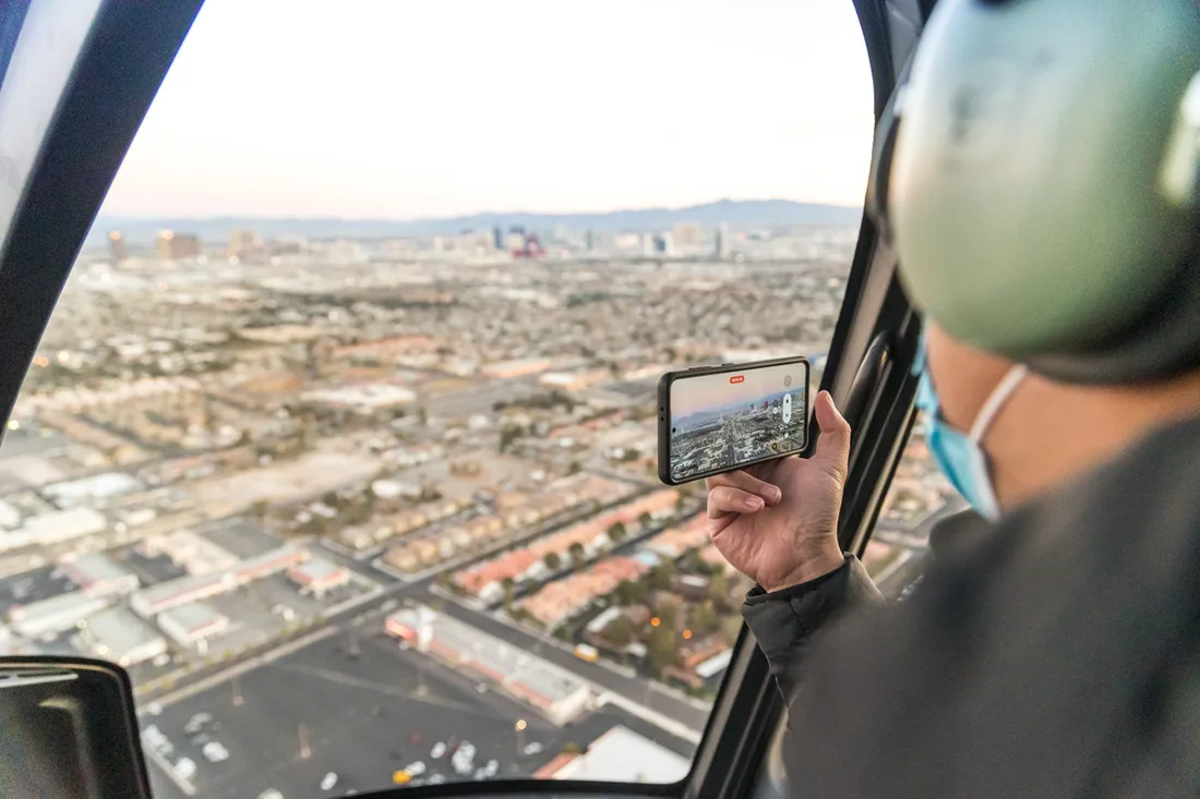 The neon Las Vegas Strip seen from a helicopter at night